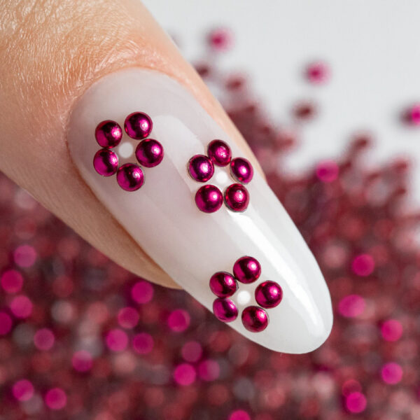 borchie fucsia scuro nail art piccole